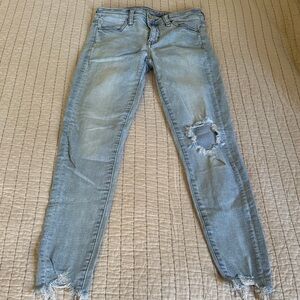 Distressed Light wash American eagle jeans